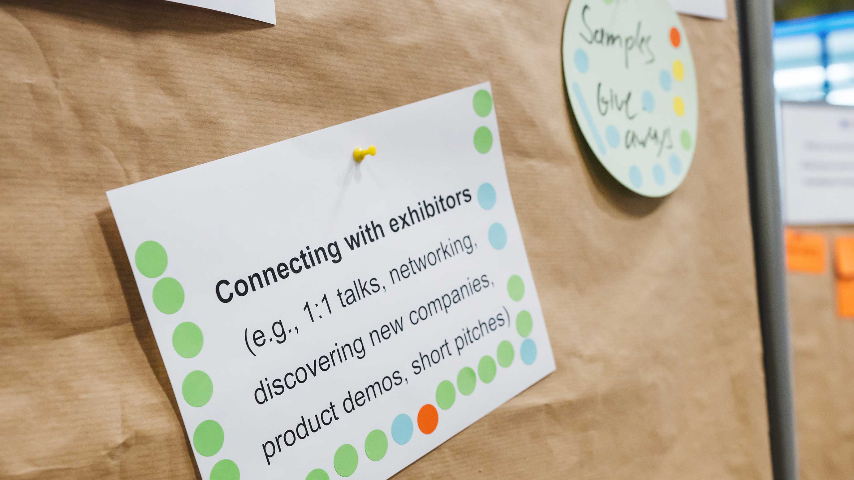 Card about connecting with exhibitors on a pin wall